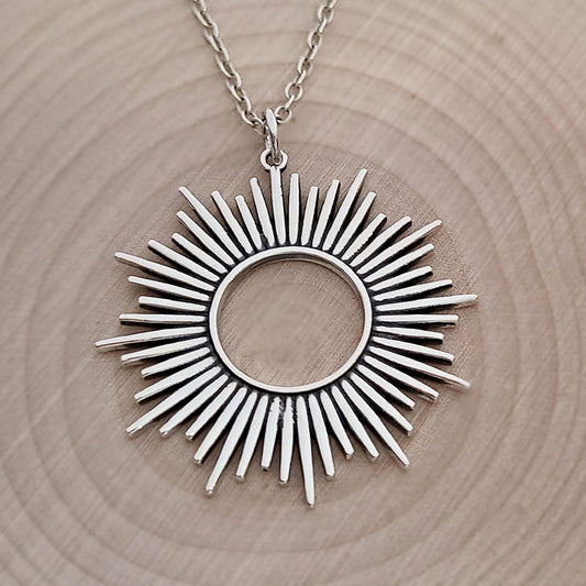 Sterling Silver Spikey Sunburst Pendant -- EF0181